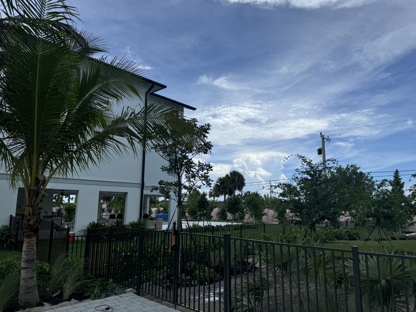 Black aluminum fence at a Keys home